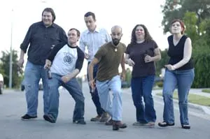 An old picture of some LGT members breaking into a run